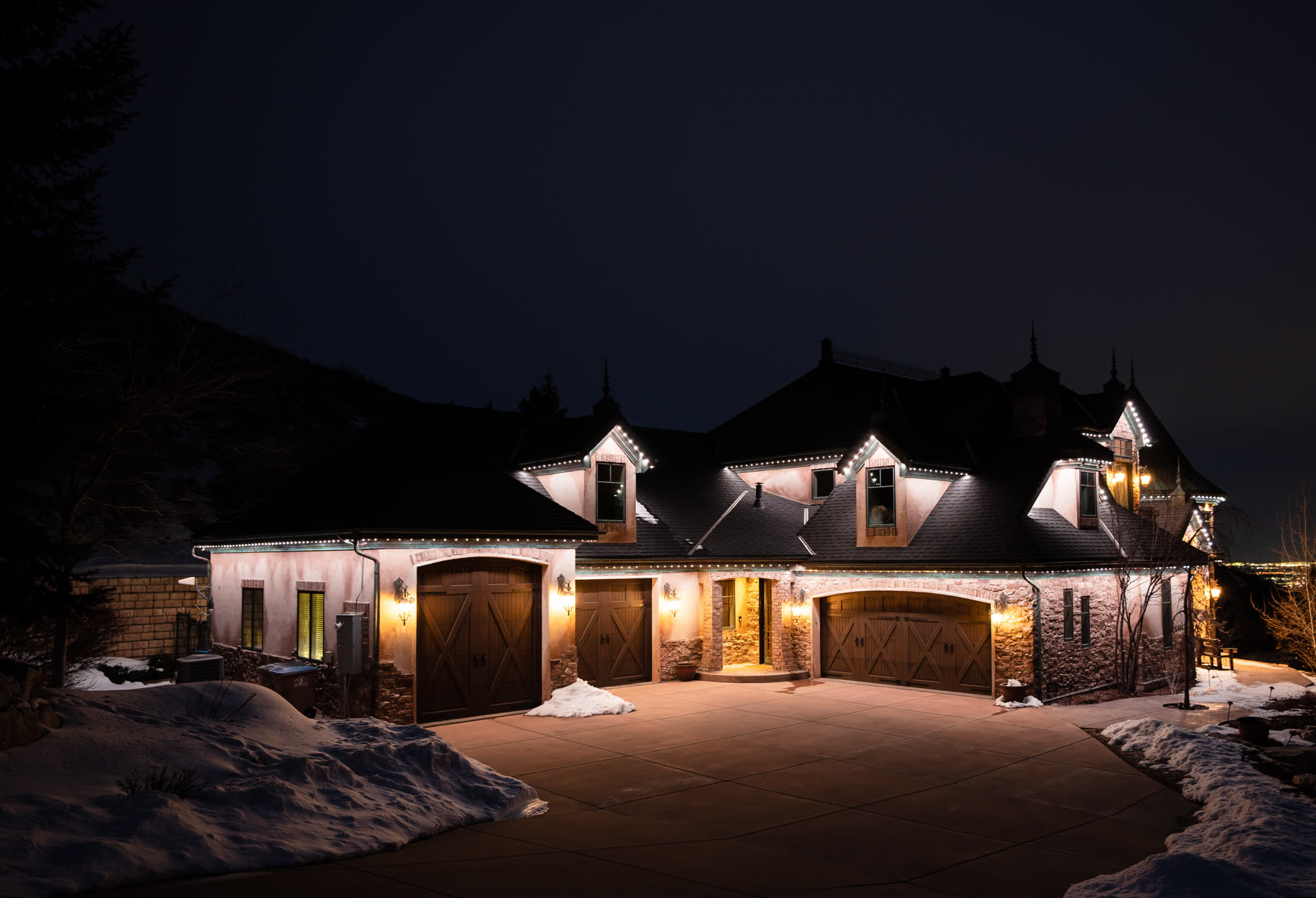 Same Fresno home in cool-white security mode (5000K) at night