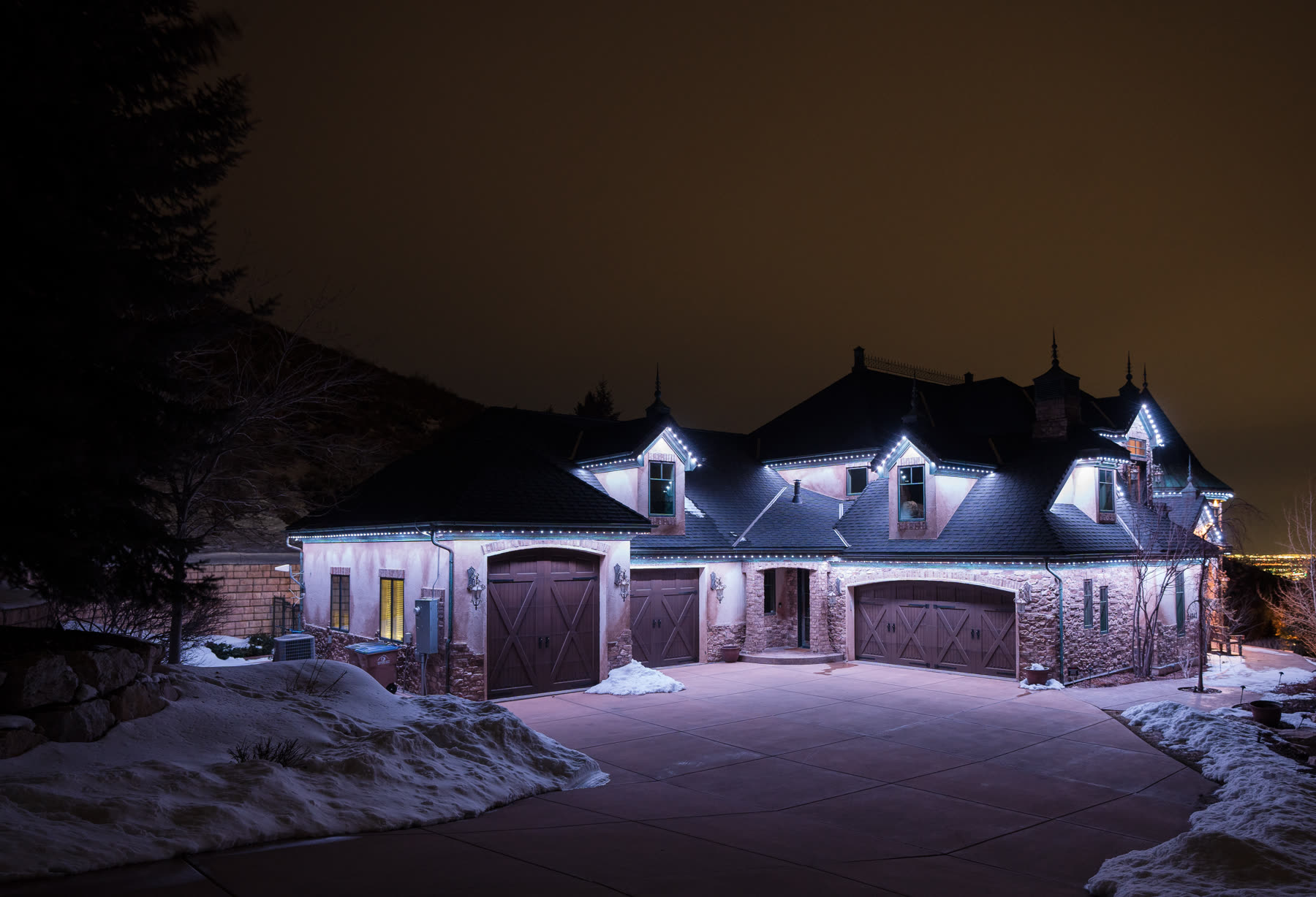 Same Fresno home in warm-white relaxation mode (2700K) at night