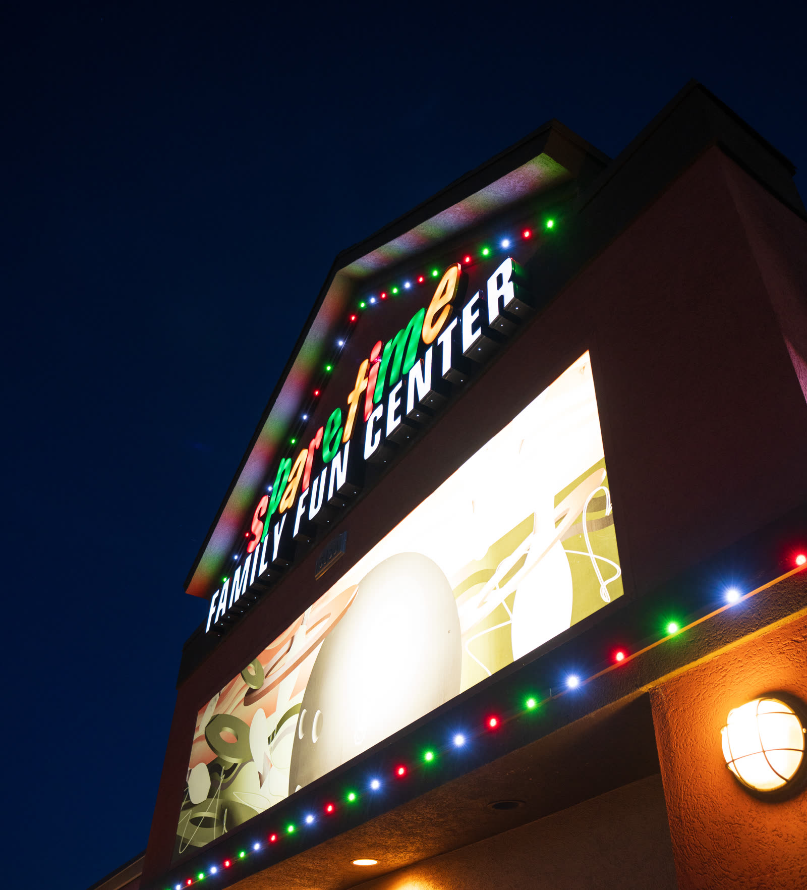 Hotel & Resort Permanent Lighting portfolio — two-story facade install by Twilight Zone Permanent Lighting