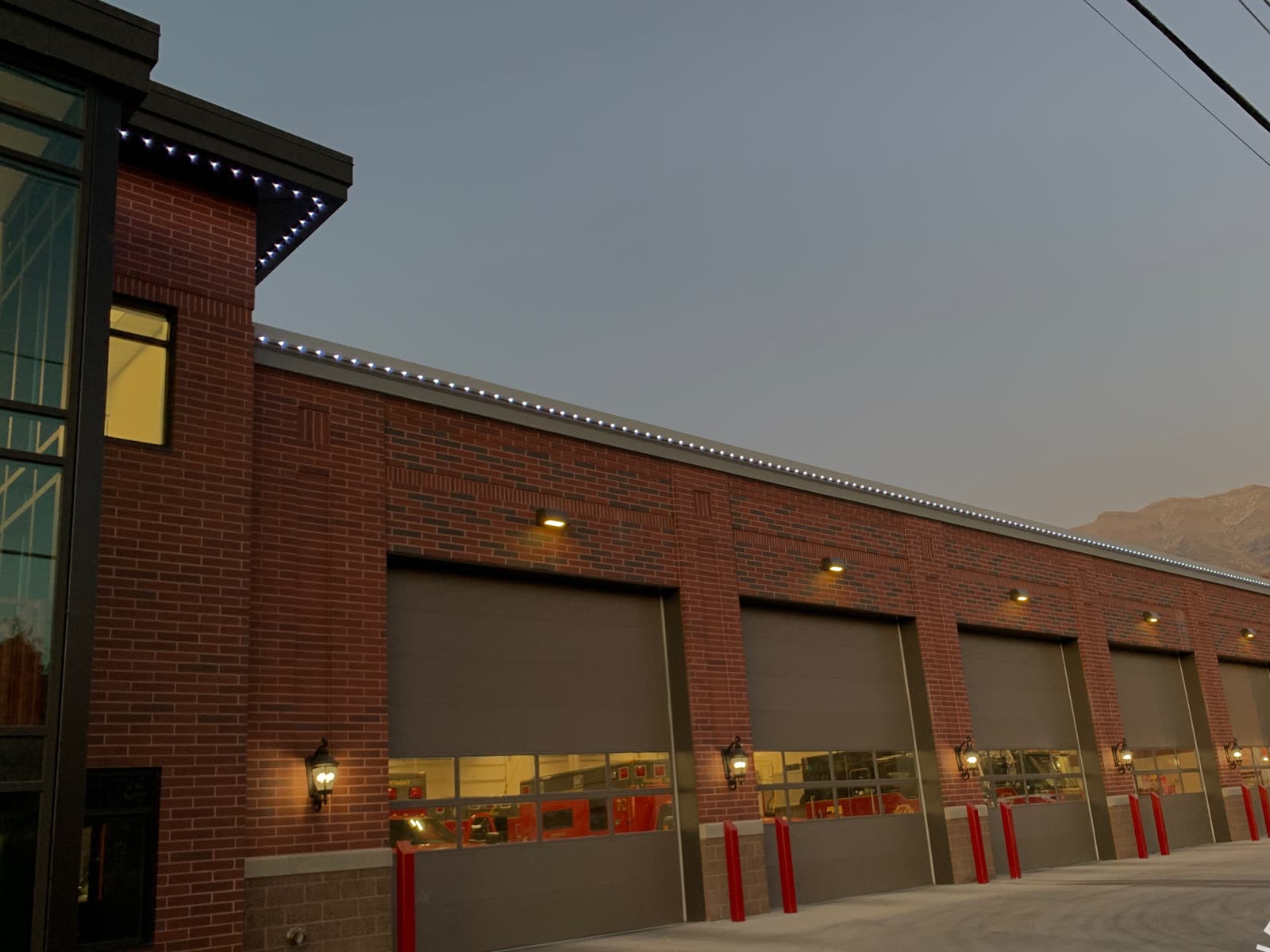 Recent work — full-perimeter install at twilight by Twilight Zone Permanent Lighting