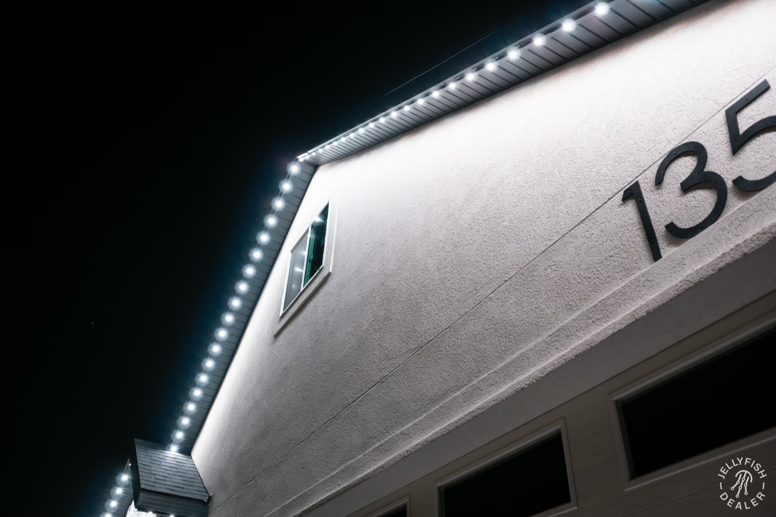 Bright cool-white security lighting on residential entrance